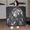 Olga Azaroff and crystal portrait of Bob Marley